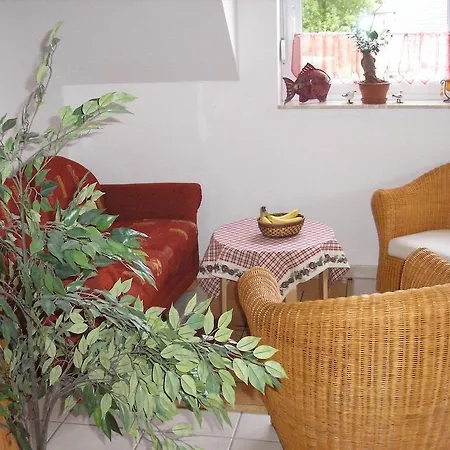 Апартаменты Ferienwohnung Mowe Цингст